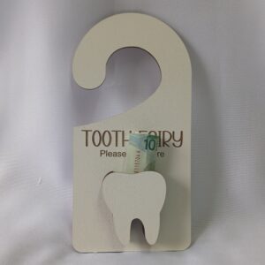 Door hanger for little kids that are losing baby teeth.